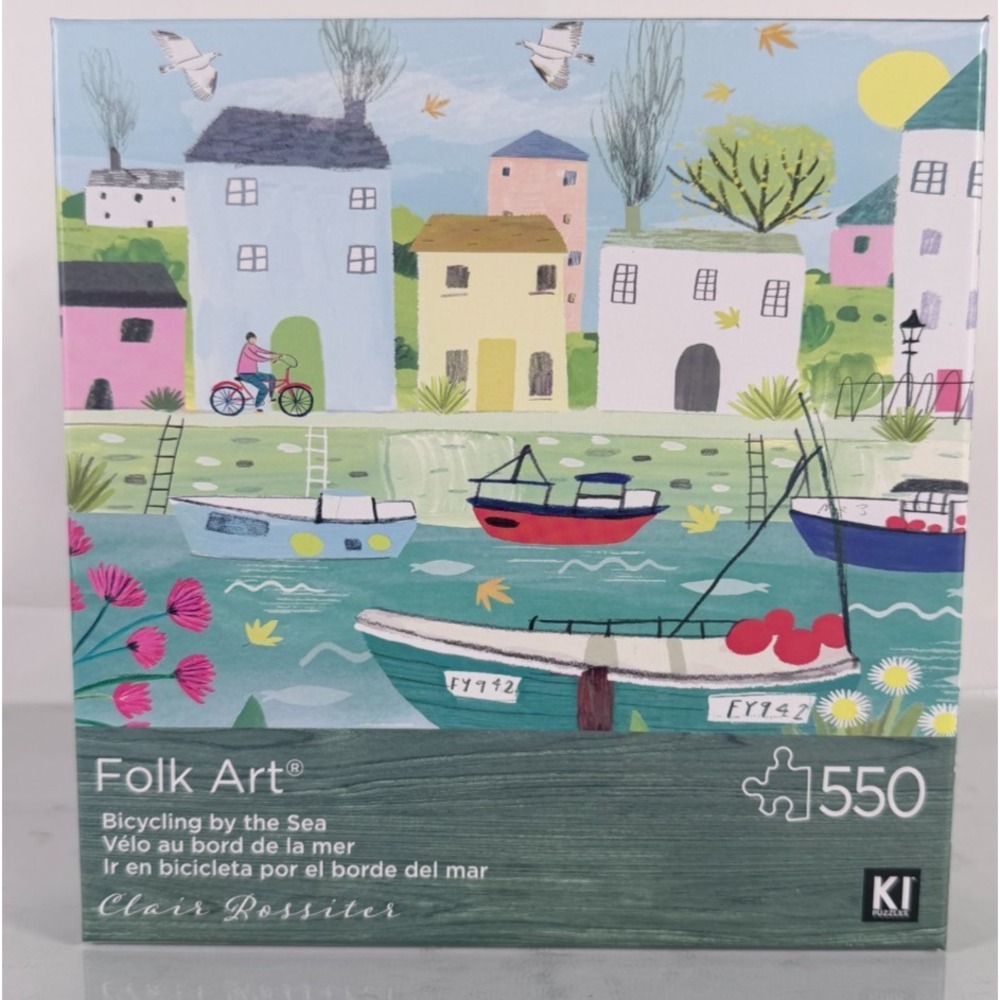Bicycling by the Sea jigsaw puzzle 550 Pieces harbor village boats flowers ocean